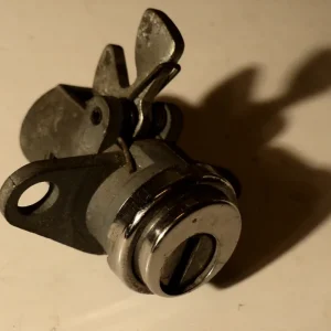 1956 Mercury glove compartment lock risnedsättning