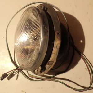 1957 Mercuryheadlight potright Säker betalning