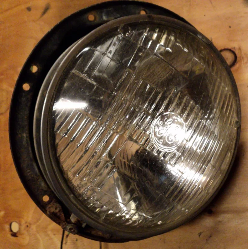 1955 Cadillac headlight pot right Outlet