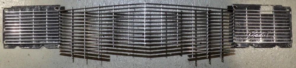 1966 Cadillacgrill(emblem damaged see picture) Note only in stor Rea