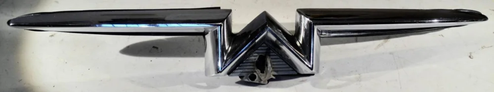 1957 Mercury chrome at trunk lock (with key) Billig